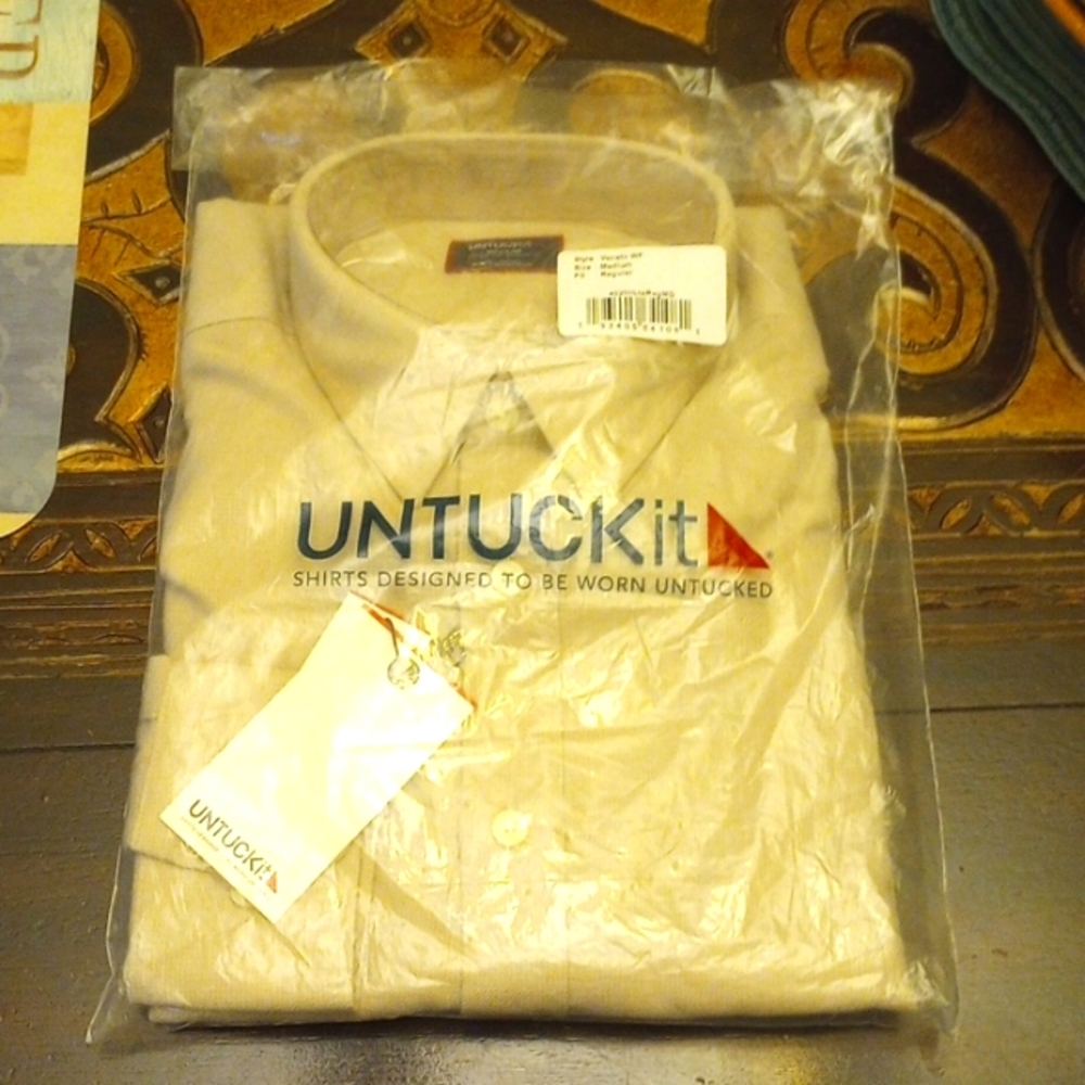 NWT in package Medium khaki Untuck it shirt.